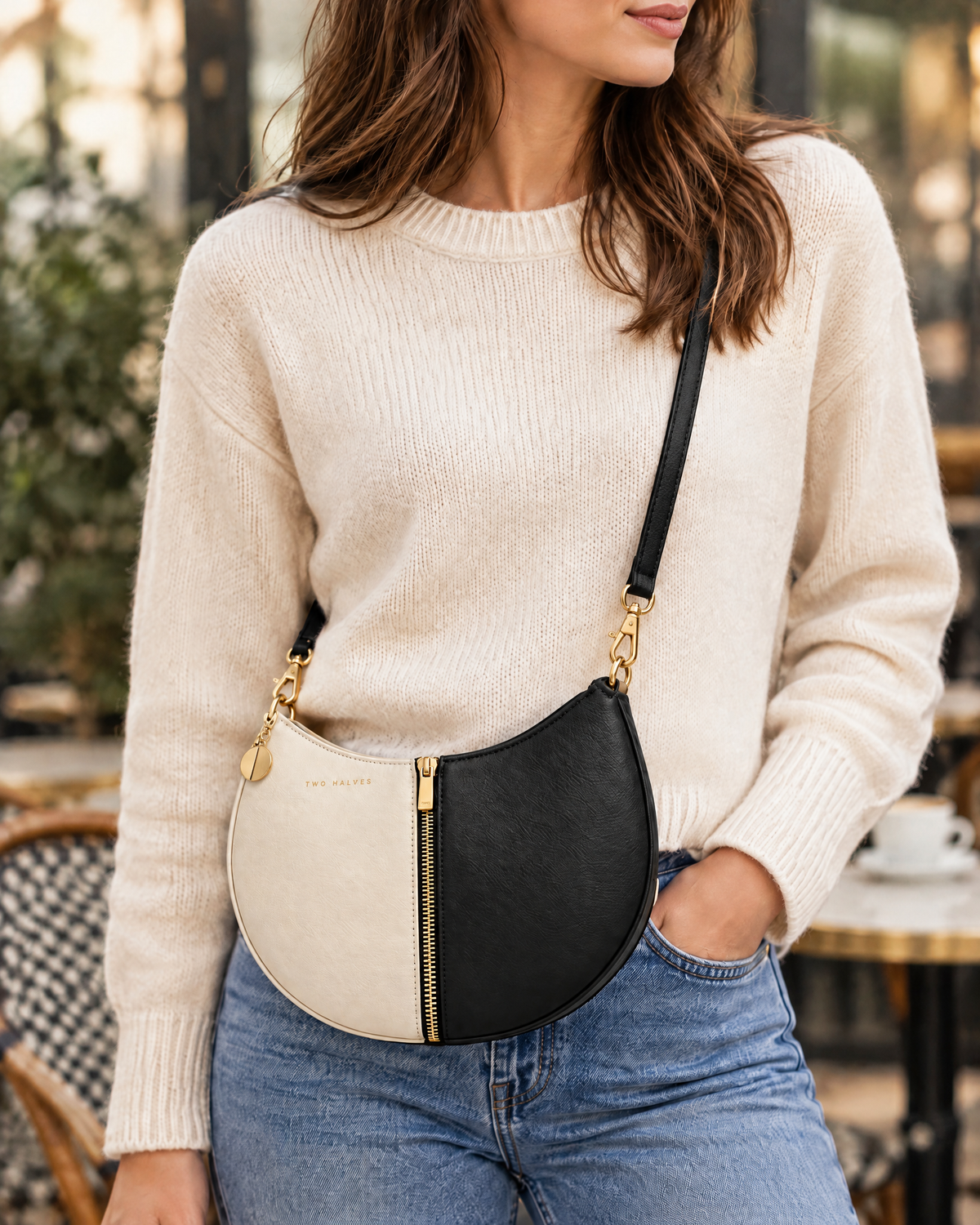 Worn crossbody with the detachable strap